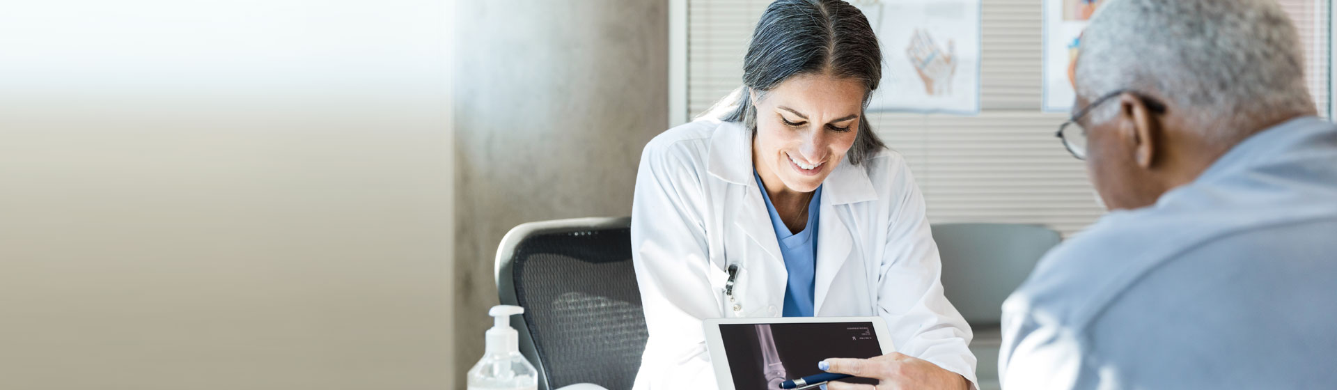 Doctor showing patient his scans
