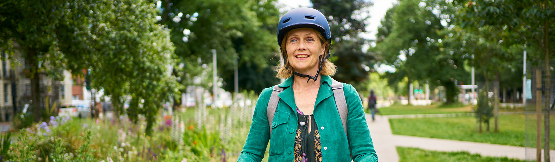 Woman riding bike in park